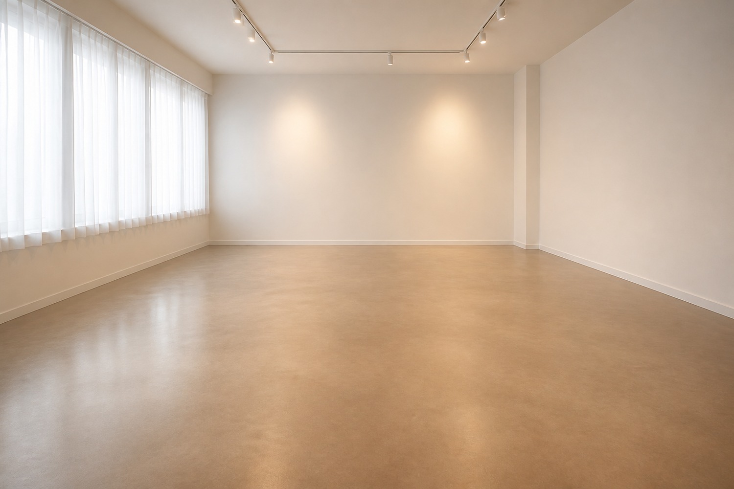Studio floor with a decorative coating under warm light