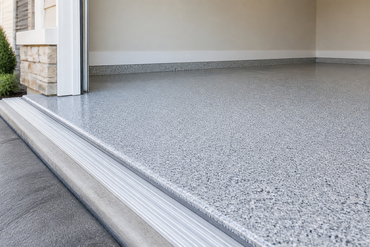 Attached garage floor with a light flake coating